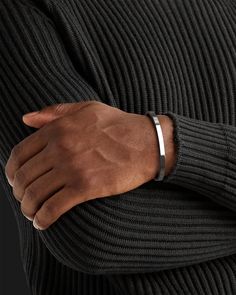 Whether you're looking for a traditional look or something newer, this cuff for men is a timeless piece of jewelry that you can wear for official events and everyday life.When choosing a men's jewel, ensure the style and material match your outfit. Choosing a comfortable men's bracelet is essential in ensuring it fits perfectly.Their exteriors and minimal shape allow the precious metal plating to shine through. You can wear them alone or with other minimal accessories with similar tones. This is the perfect piece to accessorize your wardrobe. Metal: 925 Sterling Silver / 24k Gold Plated / Rhodium over 925 Sterling Silver Dimensions: 6 mm W One Size Fits Most The cuff can open and close, is a malleable metal and carefully can adjust to your wrist. Type: Cuff 100% Handcrafted Package: High q Mens Wrist Accessories, Men Bracelet Silver, Mens Accessories Bracelet, Mens Cuff Bracelets, Wrist Accessories, Mens Bracelets, Minimal Accessories, Mens Bracelet Silver, Men Bracelet