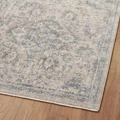 an area rug is shown on the floor with wood floors and hard wood flooring