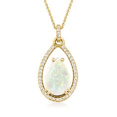 Ross-Simons - Opal, .17ct t. w. Diamond Pendant Necklace in 14kt Yellow Gold. 16". This alluring pendant necklace showcases a mesmerizing 12x8mm pear-shaped opal cabochon nestled inside a glistening halo of .17 ct. t. w. round brilliant-cut diamonds. The supple design is entirely crafted of polished 14kt yellow gold. Suspends from a cable chain. Springring clasp, diamond and opal pendant necklace. Opal birthstones are the perfect gift for October birthdays. October Birthdays, Opal Birthstone, Necklace Opal, Detailed Necklace, Opal Pendant Necklace, Jewelry Clasps, Opal Color, Natural Gold, Diamond Pendant Necklace