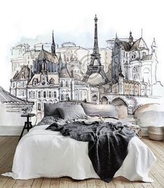 a bedroom with a drawing of the eiffel tower