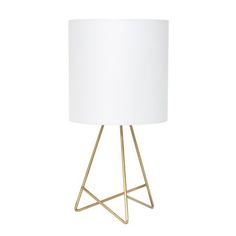 a white lampshade with a gold metal base and a white drum light shade