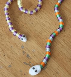 the beaded necklace is made to look like a ghost