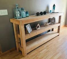 a wooden table sitting on top of a hard wood floor