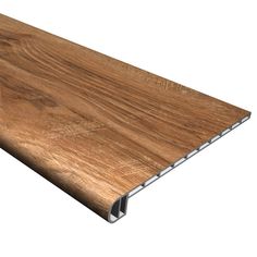 a close up view of a wood flooring board with an aluminum strip on it