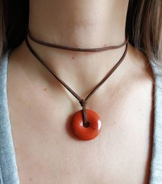 Red jasper pendant necklace; gift for woman; layered tan suede necklace -genuine red jasper gemstone pendant;  -stainless steel (non tarnish) claps closure -faux suede leather cord -ready to give as a gift, this necklace comes wrapped in a nice jewelry pouch. Please measure the neck circumference before order then select the correct size. Size is related to the upper layer of the necklace (the short layer)  Please notice that the pictures are suggestive and the original necklace may vary slightl Short Layer, Red Stone Necklace, Suede Necklace, Original Necklace, Nice Jewelry, Crystal Choker Necklace, Stone Choker, Necklace Red, Stacked Jewelry