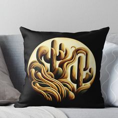 a black and yellow throw pillow with the letter p on it