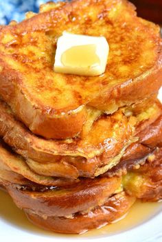 the best french toast recipe for breakfast or brunch with butter and syrup on top