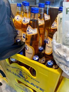 there are many bottles of beer on the cart