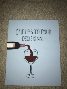 a wine glass being filled with red wine next to a sign that says cheers to four decisions