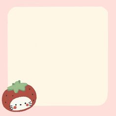 a hello kitty strawberry with a green bow on it's head is next to a blank paper