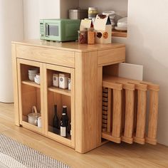 a kitchen with wooden cabinets and appliances on the counter