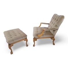 an old fashioned chair and footstool sitting next to each other on a white background