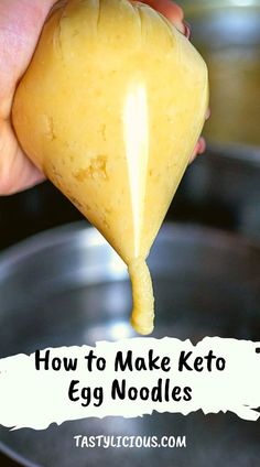 a person holding a piece of food over a frying pan with the words how to make keto egg noodles