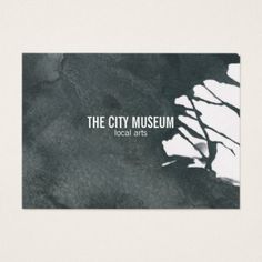 the city museum business card with black and white watercolor paint on it's back