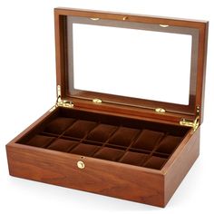 an open wooden watch box on a white background