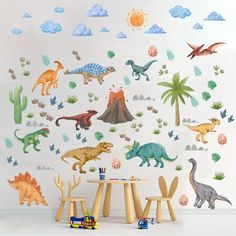 the dinosaur wall decals are all over the room