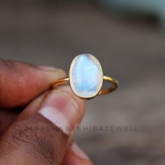 Natural Moonstone Ring, Solitaire Engagement Ring, 18k Gold Vermeil Ring, Birthstone Ring, Rainbow Moonstone Ring, Dainty Weeding Women Ring SHOP LINK:- https://www.etsy.com/shop/MaaShabashibaJewell?ref=seller-platform-mcnav 》D E T A I L S《 Gemstone: Natural Rainbow Moonstone Gem Color: Blue Stone Shape: Oval Metal: 925 Sterling Silver Purity: 925 Parts Per 1000 Setting Type: Bezel Set Silver Polish: High Ring Size: All Size Available Please note that there Can be slight variations in stone text Luxury Gift Moonstone Open Ring, Yellow Gold Moonstone Cabochon Ring For Wedding, Yellow Gold Cabochon Moonstone Wedding Ring, Minimalist Oval Cabochon Wedding Jewelry, Yellow Gold Moonstone Oval Cabochon Ring Gift, 14k Gold Moonstone Ring Gift, Oval Cabochon, Gift Moonstone Ring In 14k Gold With Oval Cabochon, 14k Gold Moonstone Ring Oval Cabochon For Gift, Gift 14k Gold Moonstone Ring Oval Cabochon