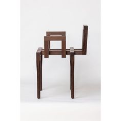 a wooden chair that is shaped like a square and rectangles it's legs