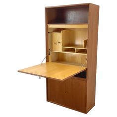 a wooden desk with an open drawer on the top and bottom shelf above it, against a white background