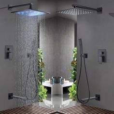 the shower head is open and there are plants in it