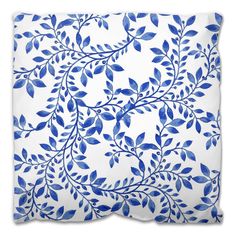 blue leaves and branches on a white background seamless wallpaper, fabric or paper