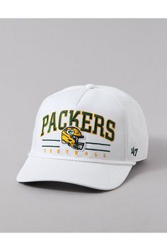 a white hat with the words packers on it and a football helmet at the front