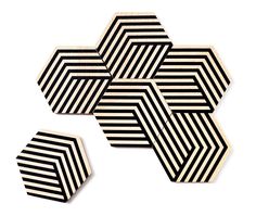 four black and white striped hexagonals on a white background