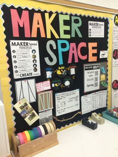 a bulletin board that says maker space on the front and back of it, along with other items