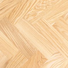 an image of wood flooring that looks like herringbones