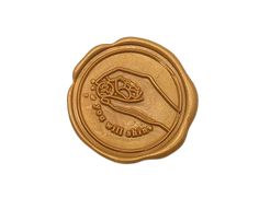 a wax stamp with an image of a hand holding a flower on it's side