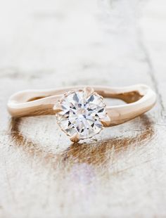 an engagement ring with a diamond in the center