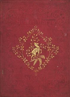 an old red book with gold designs on the front and back cover, featuring a kangaroo surrounded by leaves