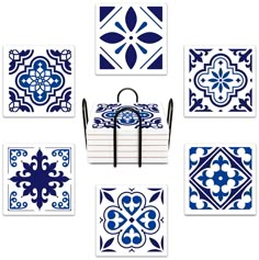 six blue and white tiles with handles on each side, one in the middle is holding a bag