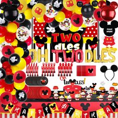 a mickey mouse themed birthday party with balloons and decorations