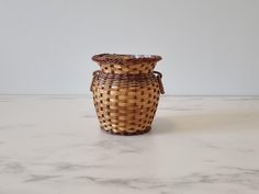 a basket sitting on top of a white counter