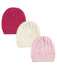 three knitted hats with different colors and patterns on the top one is pink, one is white