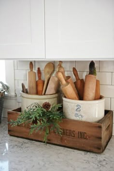 the kitchen counter is clean and ready to be used as a utensil holder