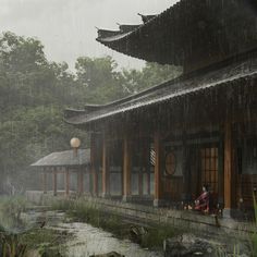 a person sitting on a bench in the rain