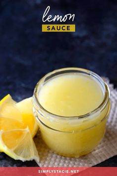 lemon sauce in a small glass jar next to sliced lemons on a cloth with text overlay