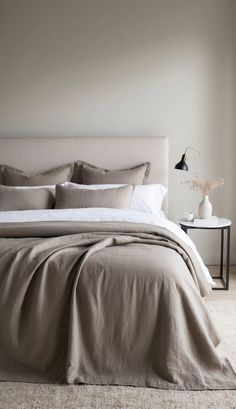 Neutral Bedroom Ideas for a Calm Serene Space 1 Neutral Bedroom Ideas, Beige Ottoman, Neutral Bedroom Decor, Grey Duvet