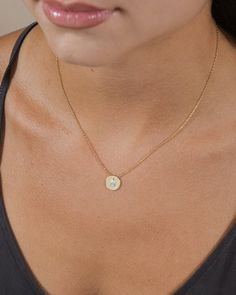 Take your everyday accessory game up a notch with the Cassie Circle Pendant Necklace. Crafted with sparkling CZ stones, this gorgeous pendant adds just the right amount of bling for any occasion. Materials: 14K gold ﻿or﻿﻿ rhodium plated brass, cubic zirconia Features: Measures 16" with 2" extender, 0.45" pendant, 5mm CZ stone, Lead & Nickel free, lobster clasp Gold Circle Pendant Necklace, Circle Pendant Necklace, Gold Circle, Cz Pendant, Everyday Accessories, Pearl Earrings Dangle, Sterling Silver Hoops, Circle Pendant, Gold Pendant Necklace