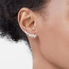 Inspired by nature's first blooms, ethical diamonds huddle together, reminiscent of flower petals blossoming up the ear. Cast with high-end recycled gold, the minimalist shared prongs leave the focus on the brilliant diamonds. Accent diamonds: 1.00+ ctw, VS2+/F+ Backing: Shepherd hook backs Ethical Diamonds, Crawler Earrings, Ear Crawler Earrings, Crawlers Earrings, Jewelry Designing, Ear Party, Types Of Diamonds, Earrings Diamond, Precious Gems