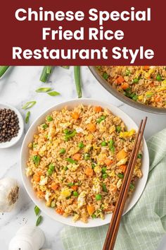 chinese fried rice restaurant style with chopsticks on the side