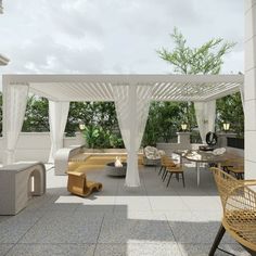 an outdoor living area with wicker furniture and white drapes over the pergolated roof