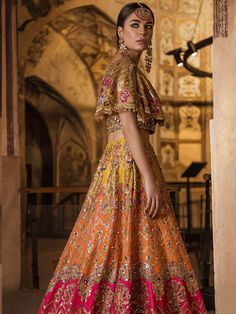 Luxury Mehndi Lehnga Choli for Wedding with Magnificent Look emblazoned with beautiful embroidery, dabka and sequins. This lehnga is unique in style and have classy look and perfect choice for traditional bride. Choli:Short Choli for bridal lehnga is yellow color is embellished with fully copper color embroidery, dabka, nakshi, stones, cutdana, crystals work. Neckline is decor with embroidery and with half sleeves. Fabric used for shirt is chiffon. Lehnga: Stylish Lehnga in three colosr is embel Mehndi Lehnga, Choli For Wedding, Raw Silk Lehenga, Bridal Lehenga Collection, Lehenga Collection, Pakistani Bridal Dresses, Indian Bridal Outfits, Wedding Dresses For Girls, Indian Attire