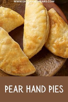 some food that is on top of a plate with the words, pear hand pies