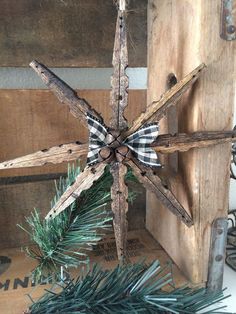 a wooden snowflake sitting on top of a table