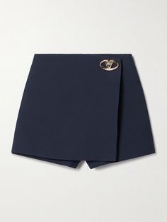 Valentino Garavani's mini skirt features the signature 'VLOGO' hardware, which doubles as a twist-lock fastening to secure the front panel and create a wrap-effect design. It's made from a wool and silk-blend and lined for a smooth fit. Match your accessories to the gold-tone metal. Valentino Shorts, Posh Clothing, Flat Dress Shoes, Floral Dresses Short, Wool Mini Skirt, Future Outfit, Swimsuit Dress, Everyday Wardrobe, Apparel Design