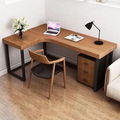 a computer desk with a laptop on top of it next to a chair and window