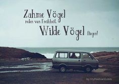 a van parked on the side of a road next to the ocean with words above it that read, zahne vogel